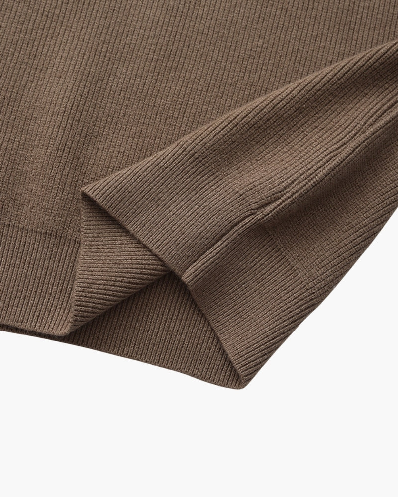 Raffinierter Strickpullover mit halbem Reißverschluss